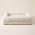 Load image into Gallery viewer, The Mr Tobias Chelsea memory-foam dog bed shown from the front in ivory bouclé