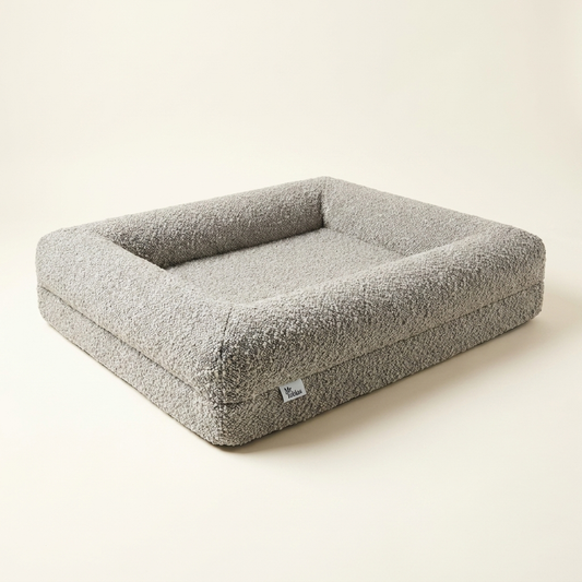 Overhead view of the Chelsea bed showing the memory-foam base and bouclé cover (stone boucle)